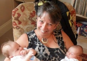 Verina holding new twin babies
